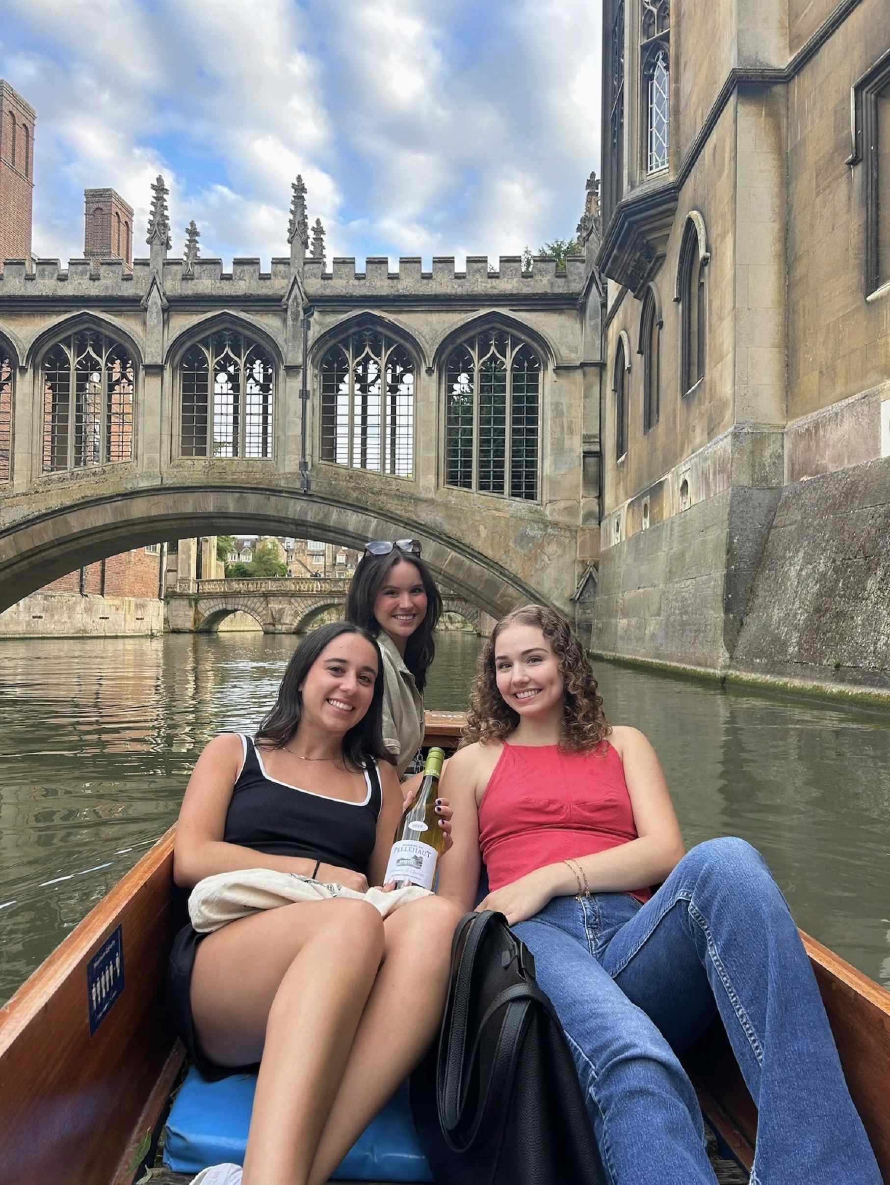 Waskiewicz and some of her friends on a boat in a canal.