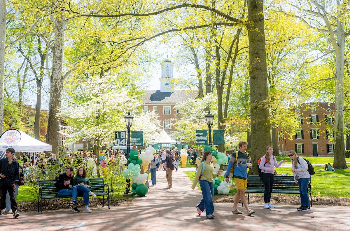 OHIO students walk on the College Green during an ice cream social in the spring