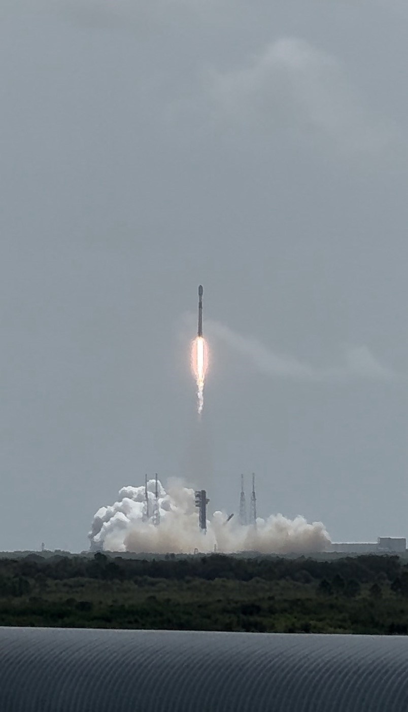 a rocket launch is pictured from a distance