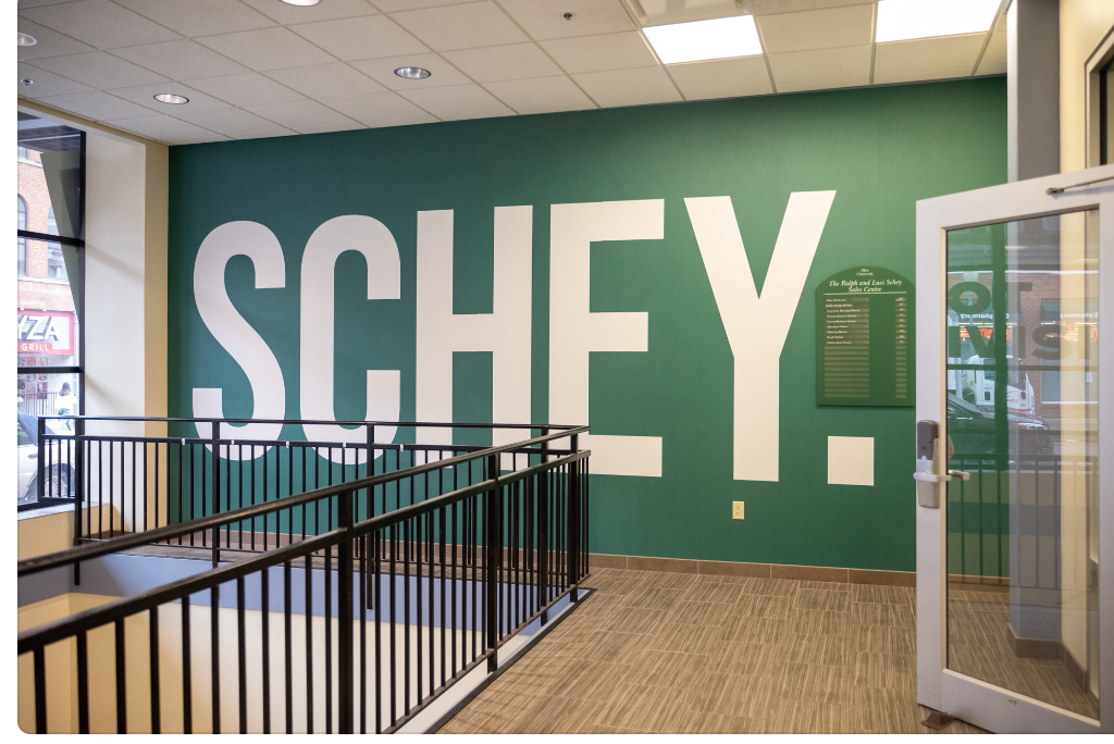 An interior shot of the Schey Sales Centre building. The words 