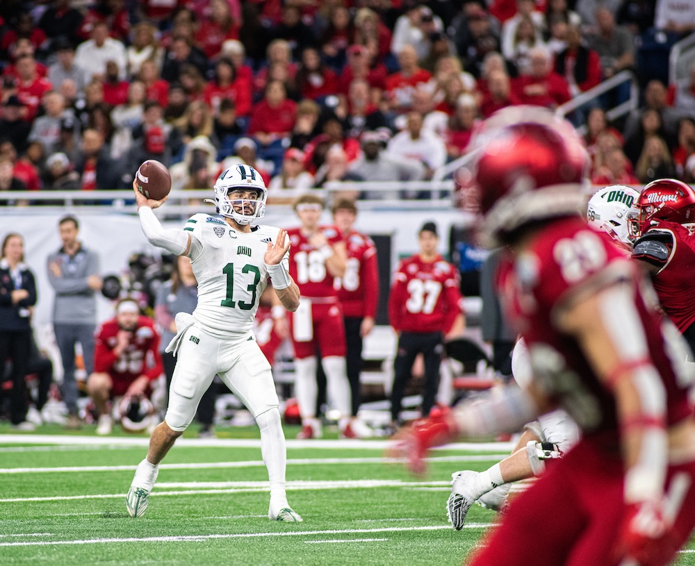 OHIO's quarterback in mid-throw at the MAC Championship game