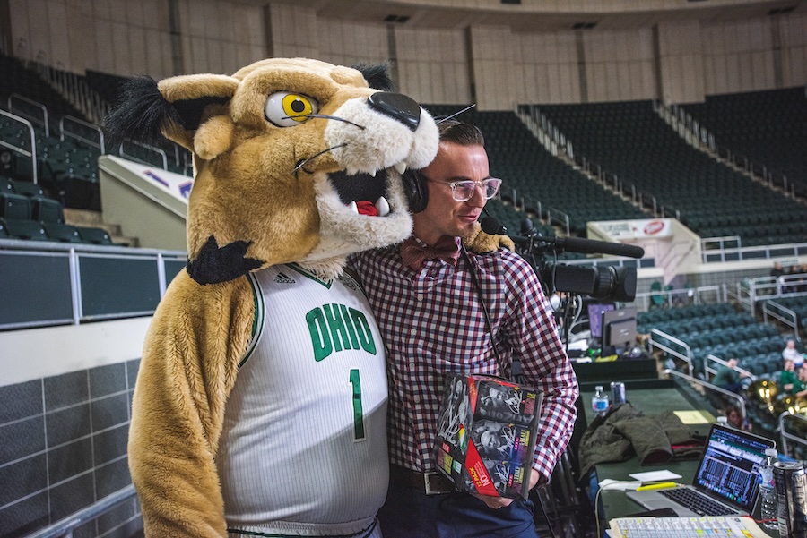 Jake Hromada poses with Rufus the Bobcat