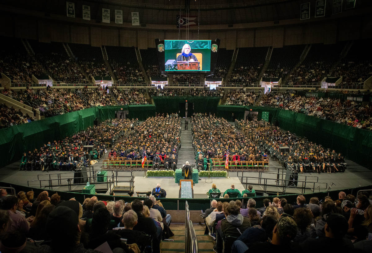 A view of the jumbotron at the Fall 2024 commencement ceremony at the Convocation Center