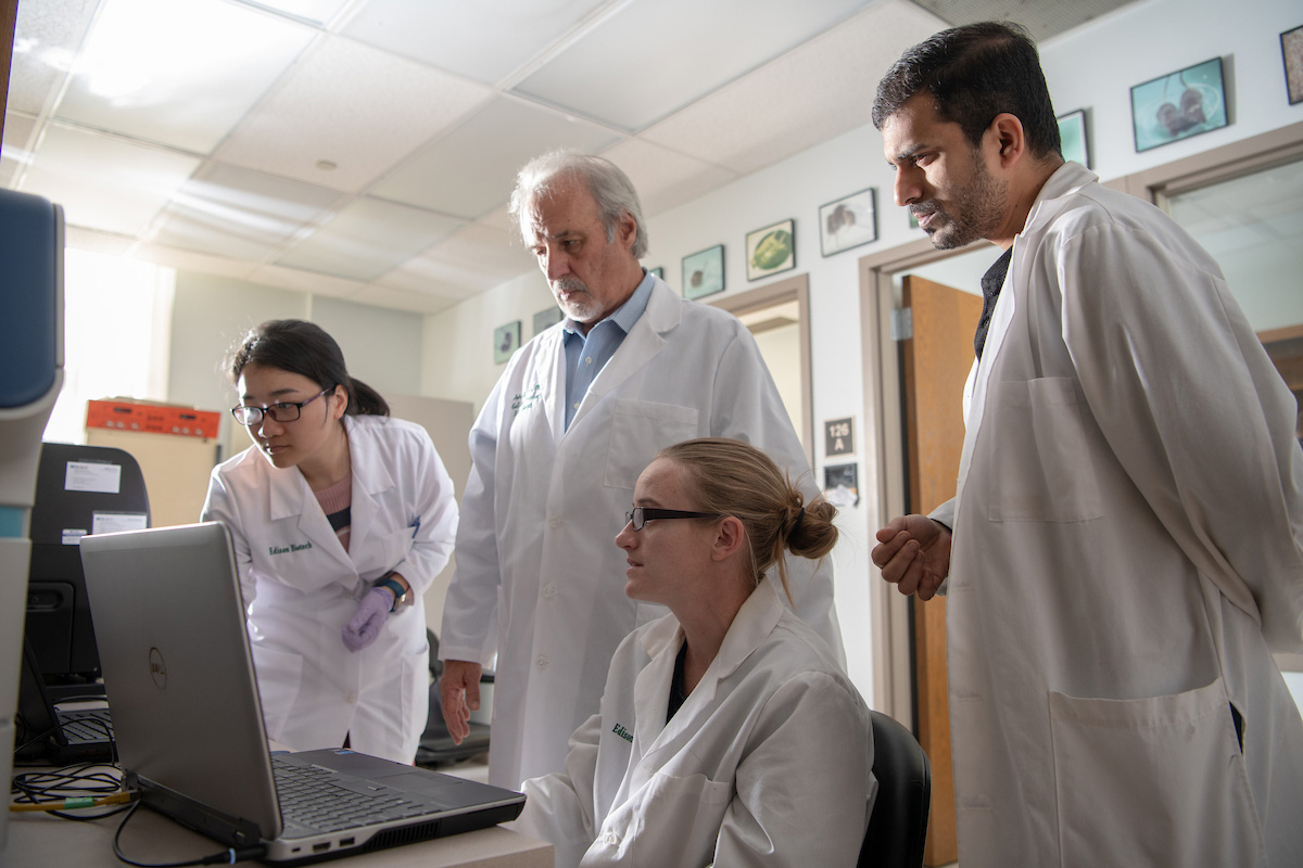 Students and faculty conduct research in a medical facility. 