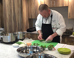 Chef Robert DeWitt prepares several Vietnamese dishes during the third Chef’s Table at Jefferson Marketplace on Thursday, March 22.