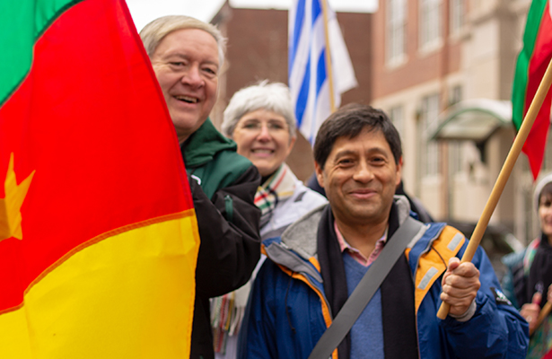 OHIO President M. Duane Nellis, Vice Provost for Global Affairs and International Studies Lorna Jean Edmonds, and PUCE Rector Fernando Ponce Léon participate in the parade of flags at OHIO’s International Street Fair.