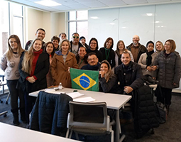 Brazilian teachers participating in the PDPI Brazil English Teachers Program pose for a photo with Aaron Schwartz, an associate lecturer in OPIE, at OHIO’s Living Learning Center.