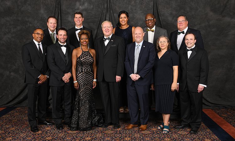 Ohio University President M. Duane Nellis is pictured with the 13 graduates honored at the 2019 Alumni Awards Gala.