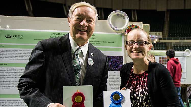 Alison Brittain poses for a photo with Ohio University President M. Duane Nellis during the 2018 Student Research and Creative Activity Expo. 