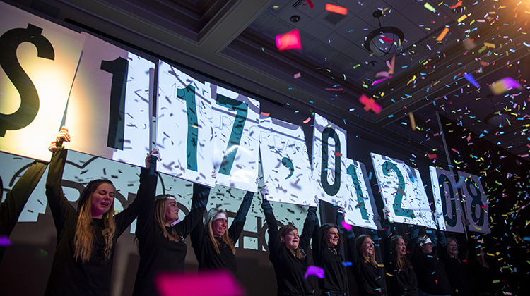 The Baker University Center Ballroom fills with confetti, cheers and a few tears as members of the BobcaThon 2020 Leadership Team reveal this year’s fundraising total.