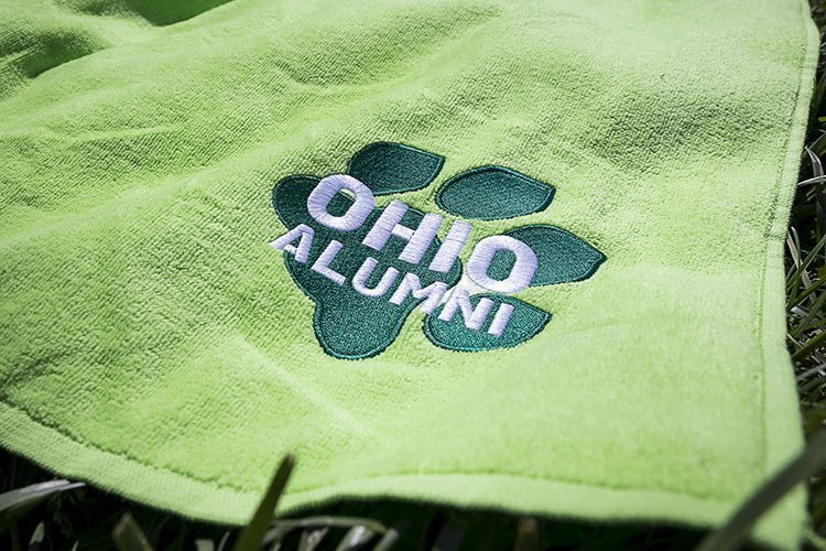 Pictured is the Paw Print OHIO Alumni Beach Towel, part of The Bobcat Store’s spring collection.