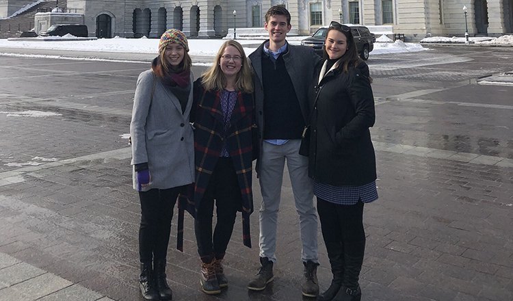 The four students selected for the inaugural cohort of Ohio University Capital Internship Program are pictured in front of the U.S. Capitol. They are (from left) Alexandra Wainright, Krissy Wahlers, Max Annable and Blair Egan.