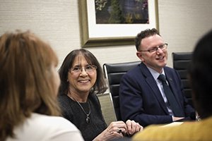 Chris Siegfried, the niece of Isabel Courtney Hall, and College of Fine Arts Dean Matthew Shaftel speak with the first two awardees of the Isabel Courtney Hall Music Education Scholar-ship and others gathered at a recent luncheon connecting the scholarship’s donors and recipients.