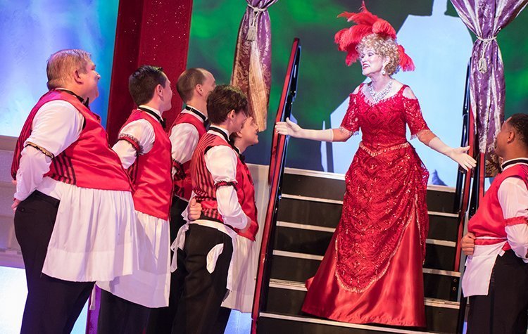 Jennifer Myers, who starred in the lead role of Dolly Levi in Ohio University Lancaster Theatre’s “Hello Dolly!”, makes a grand entrance during the 2018 production. 