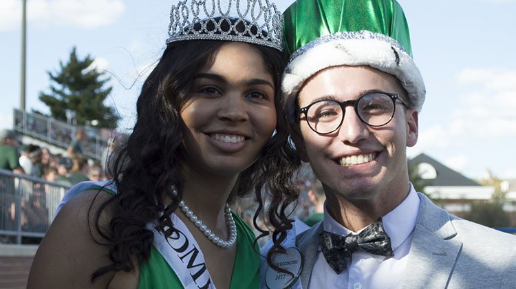 Members of Ohio University's 2017 Homecoming Court, Hannah Britton and Nick Preston, pose for a photo after being announced as Homecoming queen and king.