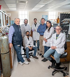 Ohio University Distinguished Professor John Kopchick and several members of his research team are pictured inside OHIO’s Edison Biotechnology Institute. They are (from left) John Kopchick, Reetobrata Basu (seated), Sam Mathes, Kevin Funk, Edward List, Silvana Duran Ortiz, and Alison Brittain.