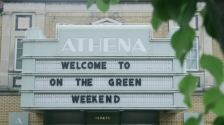 The Athena Cinema marquee reads 