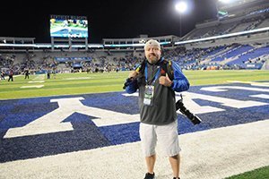 Marty Conley, BSAM ’19, is pictured at the University of Kentucky’s Kroger Field. When Conley isn’t working at the Lawrence County Convention and Visitor’s Bureau and tending to family obligations, he’s photographing area high school, college and professional sports events, as well as local concerts.