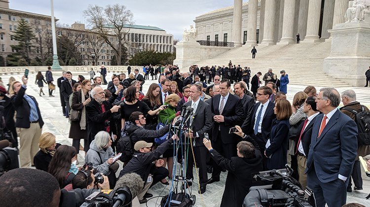 William Messenger speaks to reporters outside of the U.S. Supreme Court.