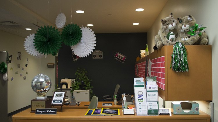 Ohio University’s Office of Community Standards and Student Responsibility is pictured during the 2017 Paint the Town Green decorating contest. The office won the Baker Cup for its mix of music-themed decorations, handmade brick road posters and Bobcat accents.