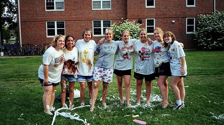 Sara Bouchard, BSCD ’99, MA ’01, poses with fellow resident assistants following a service project they organized.