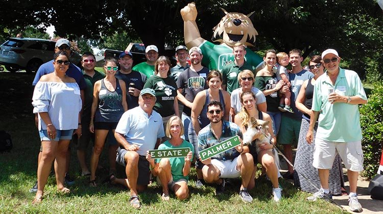 Ohio University attendees gather for a group photo at the 30th annual OSU-OHIO Picnic at Lake Norman. 