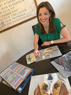 In an eight-day period, Ohio University graduate Lyndale (Allison) Reisinger, BSC '09, MA' 12, raised more than $3,500 for the Mid-Ohio Foodbank by drawing more than 20 portraits of people’s pets.