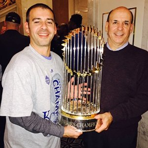 Dean Taylor and his son, Colby, pose with the 2015 World Series trophy after the Kansas City Royals defeated the New York Mets. A 1975 graduate of OHIO’s Sports Administration Program, Dean Taylor created the Walter O’Malley Scholarship Fund in honor of the program’s visionary.