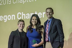 Jenna Holeman, BSJ ’17, from the Oregon Chapter is presented the 2019 Cutler Outstanding Chapter Award during the Celebration of Volunteerism.
