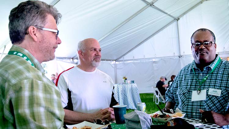 (L-R) Old friends David Holt, BBE ’91; Mark Deaton, BBE ’83; and Gregory Moore, BSC ’83, have attended every On The Green Weekend together since 2014.