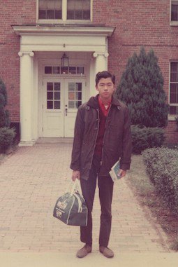 Chow poses in front of a residence hall during his early years on Ohio University’s campus. Photo courtesy of Edward Chow