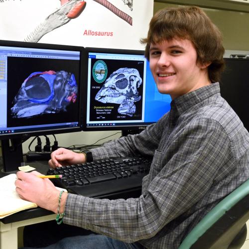OHIO student Daniel Dunfee studying skull growth in the Jurassic ornithopod dinosaur using microCT scanning. 