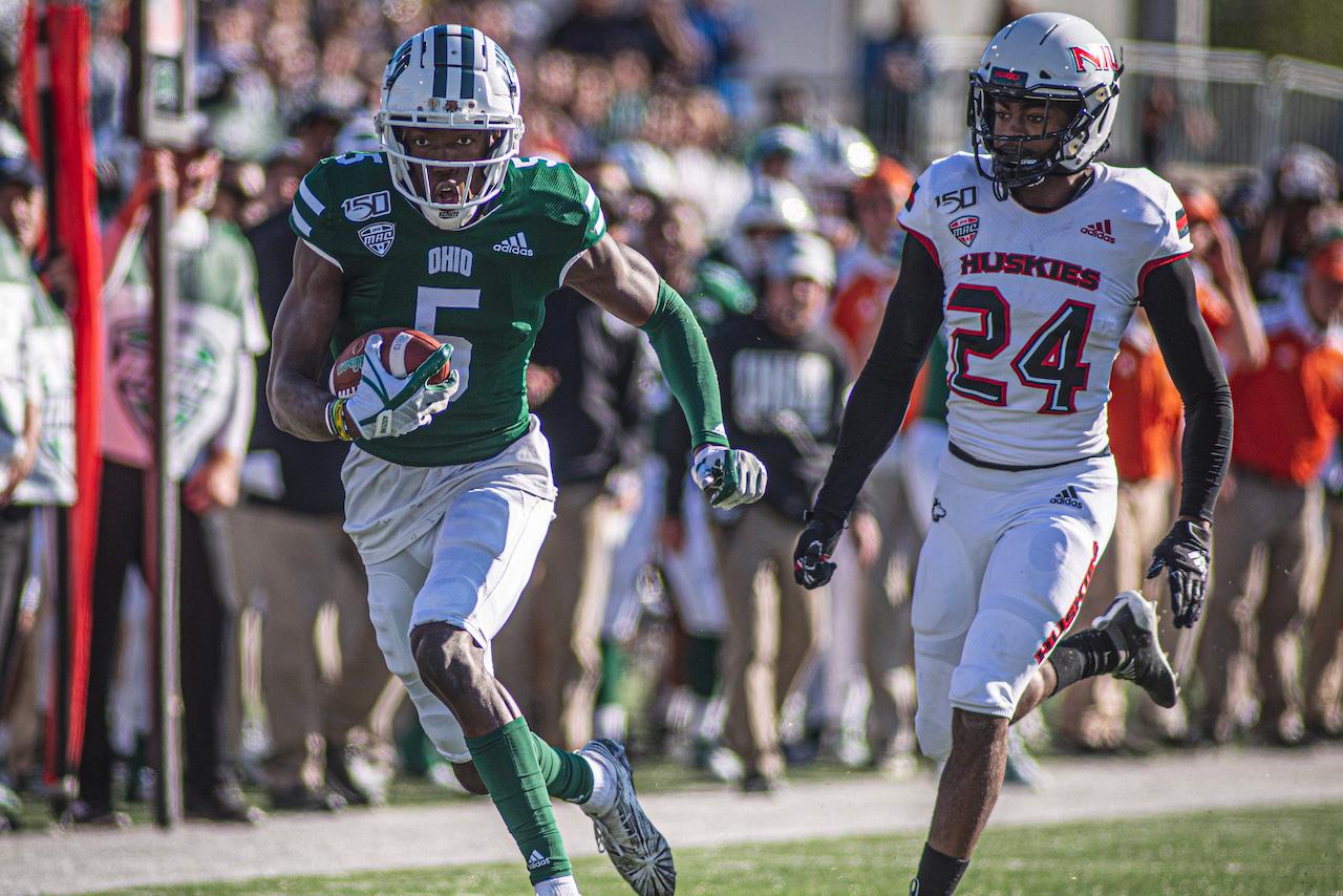 Receiver Shane Hooks running after catch