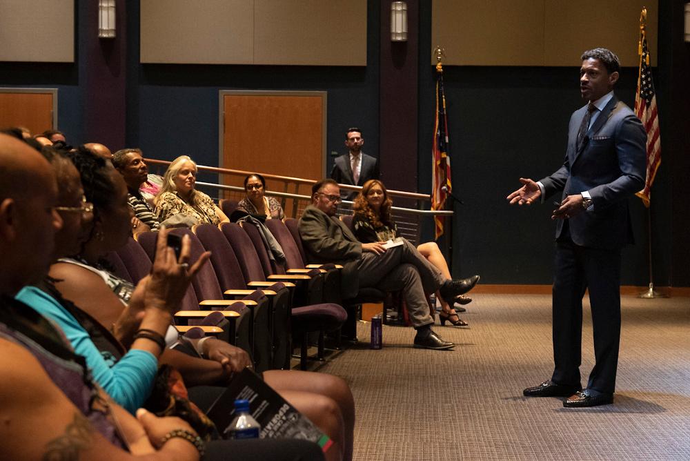 Kyle Bowser, an entertainment executive, speaks to the audience at Trial by Jury: A Case of Deportation as a part of the Challenging Dialogues lecture series. Photo by Hannah Ruhoff