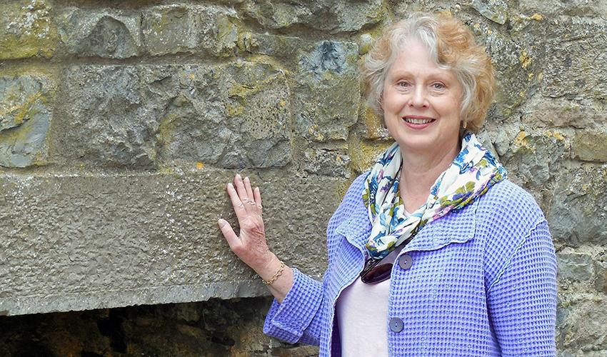 Mimi Bogard, AB ’71, poses for a photo on a trip to Ireland.