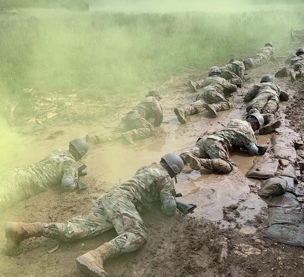 Garrett Demoss and his team go through an introduction to tactics and techniques exercise during his technical training at Lackland Air Force Base.