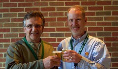 Eric Bikis and Pat Jackson making a toast