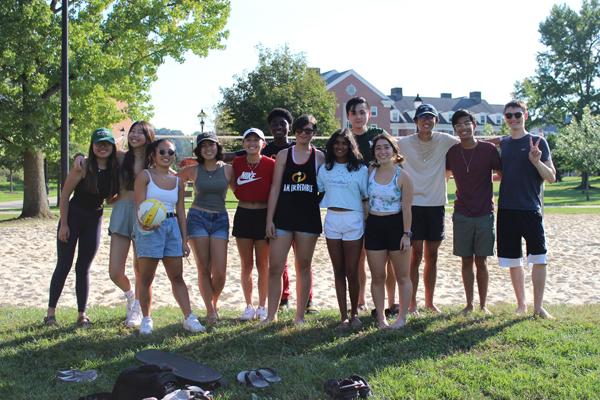 AAPISU beach volleyball members are shown at a volleyball event