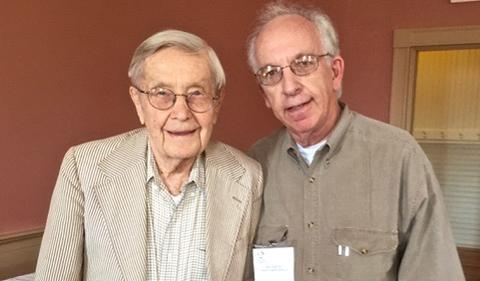 Alan Rom standing with Vernon Alden