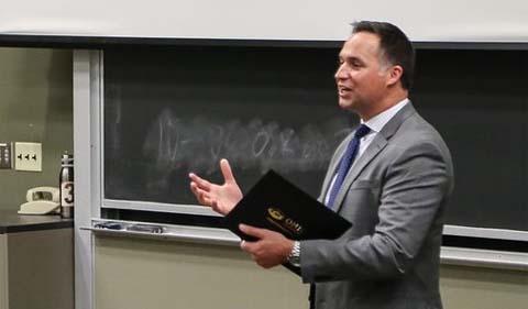 Ryan Phillips speaking in a classroom