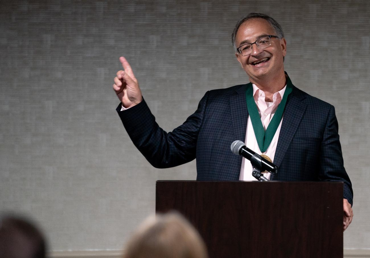 John Crum speaks at the Russ College Academy of Distinguished Graduates event