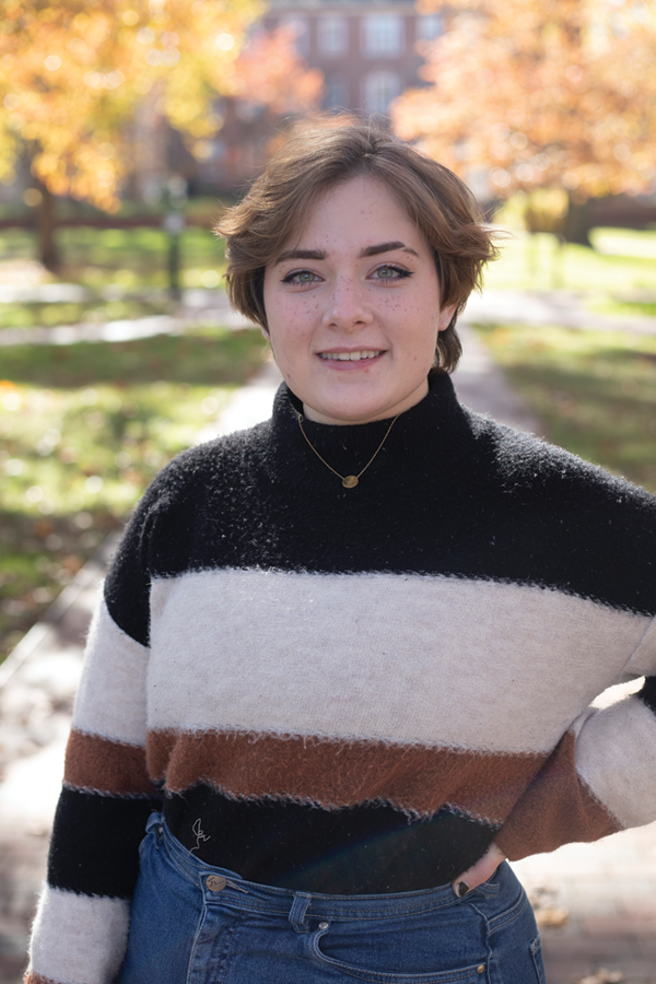 CJ Herr, BFA ’22, is pictured on Ohio University's College Green.