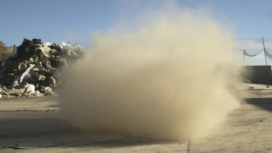 A still from a film by J Makary showing cloud of dust