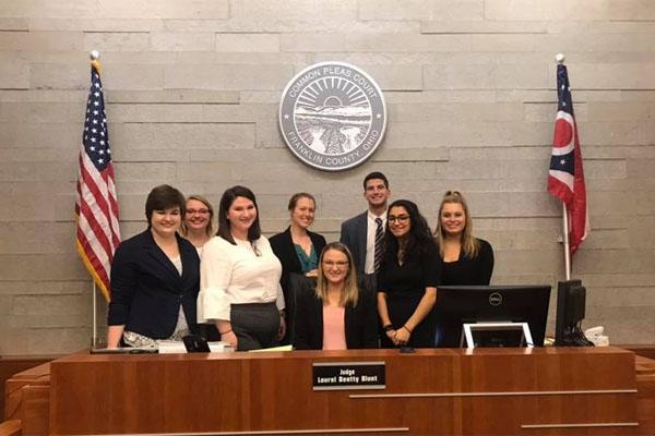 Mock trial 2018 invitational team. From left: Gabrielle Tharp, Ellen Gill, Lillian Mattimoe, Kristin Tate, Taryn Osborne, Ryan Crowley, Amal Afyouni, Lydia Wendel.