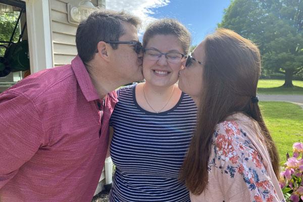 Riley Zielinski and her parents, Scott Zielinski and Amy Beech,  as they prepared for her to spend the summer in Germany.