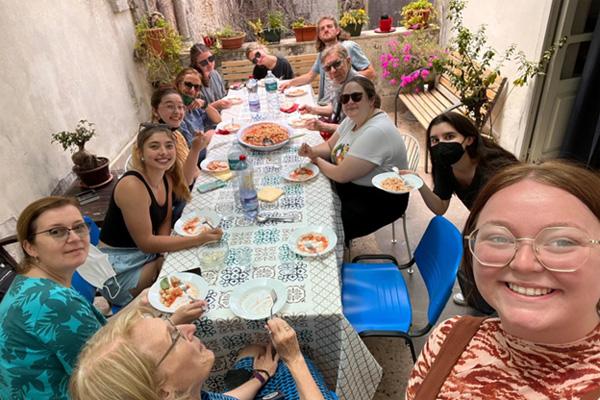 Enjoying their work making cavateddi al ragù, from bottom left: Theresa Moran, Susi Kimbell (director of the Exedra Center), Emily Jones, Sidnie Kiligour, Sefi Monterosso (Exedra Center staff), Jackie Augustine, Lauren Hates, Marco Messina (Exedra Center staff), David Bell, Faith McLaughlin, Maya Roth-Wadsworth, and Emily McCarty.