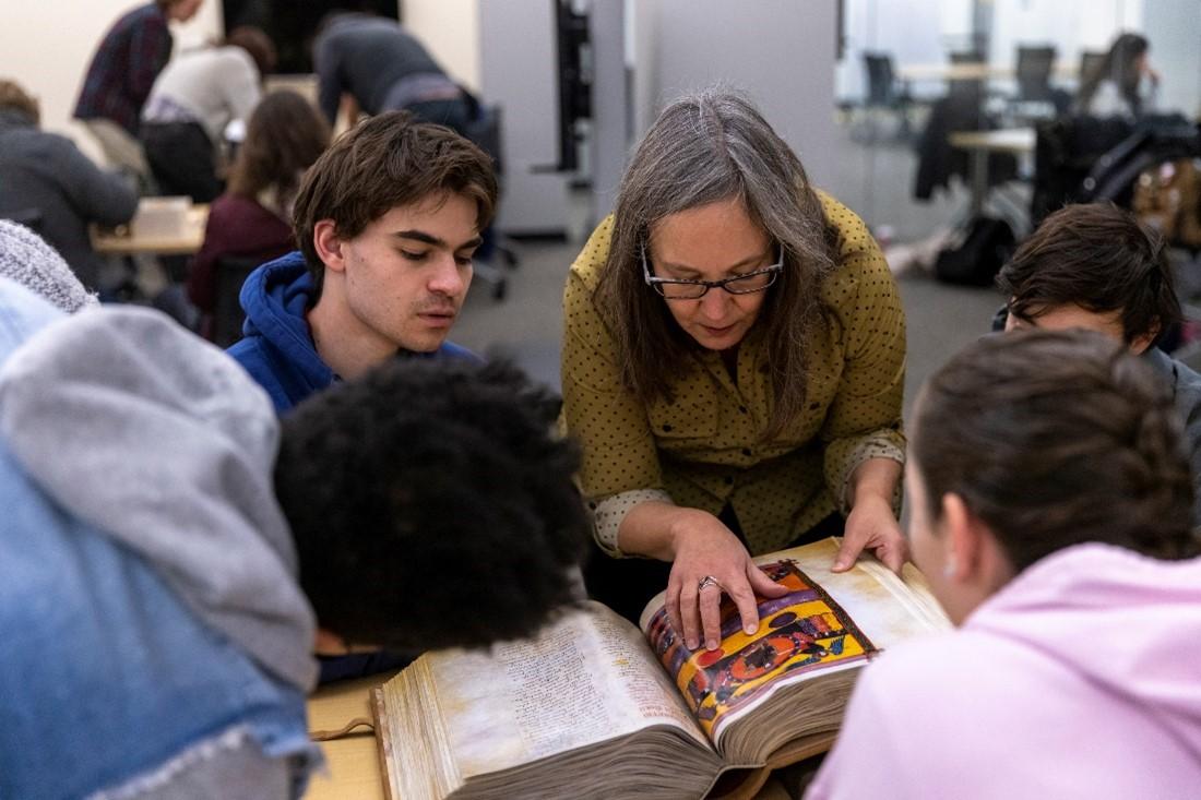 Dr. Miriam Shadis is shown with her students