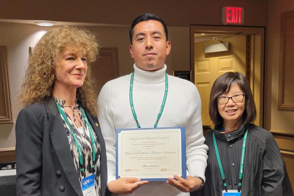 Miguel Mojarro Ramirez with two APS officials