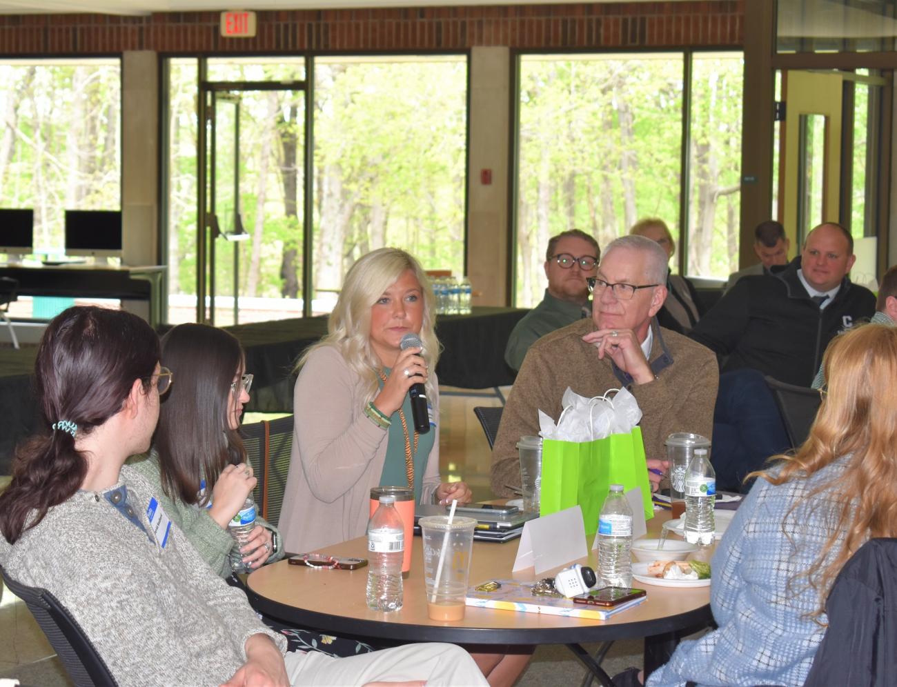 Bob Schumm and Lindsay McNeal answer questions at the mock interview event