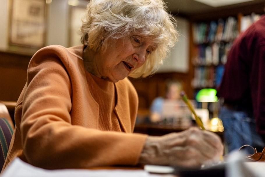 Anne Baker is shown in Alden Library